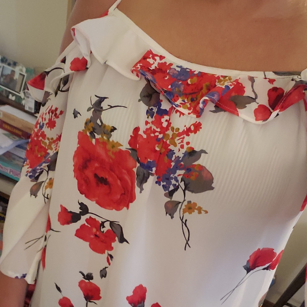 Floral blouse, shoulders showing